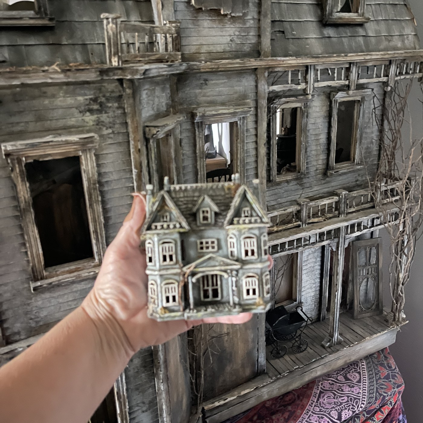 Abandoned miniature Victorian dollhouse